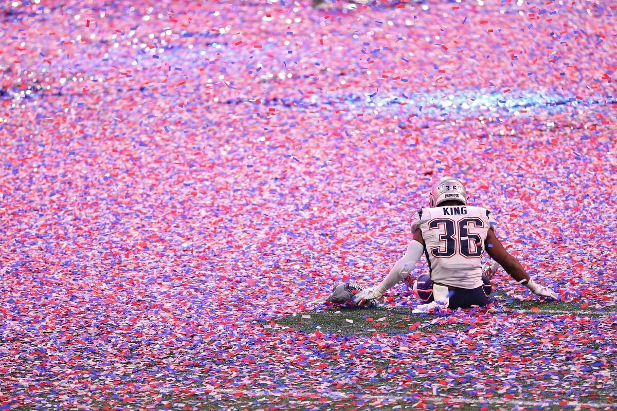 SITTING PRETTY: The New England Patriots’Brandon King takes a moment to himself, surrounded by celebratory ticker tape after the Pats defeated the LA Rams in Super Bowl LIII in Atlanta, Georgia, on February 3. Picture: Patrick Smith/Getty Images