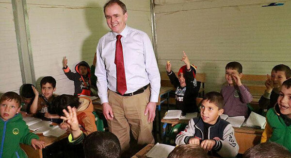 Joe McHugh, the Irish Government&rsquo;s junior minister for overseas development and a former teacher, meeting Syrian children at a school in the Za&rsquo;atari refugee camp in Jordan.