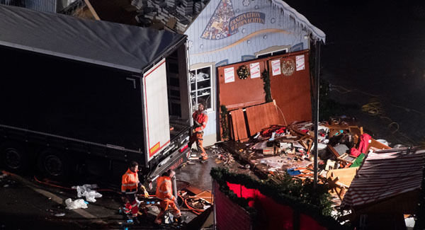 A trail of debris is pictured at the Christmas market near the Kaiser Wilhelm Memorial Church in Berlin, after the terror attack. A trail of debris is pictured at the Christmas market near the Kaiser Wilhelm Memorial Church in Berlin, after the terror attack.