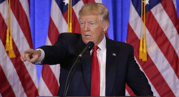 Trump says intelligence chief Clapper 'denounced false report'