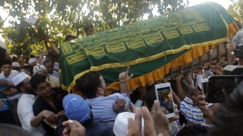 Politicians mourn murdered adviser of Burmese leader at funeral ceremony Politicians mourn murdered adviser of Burmese leader at funeral ceremony