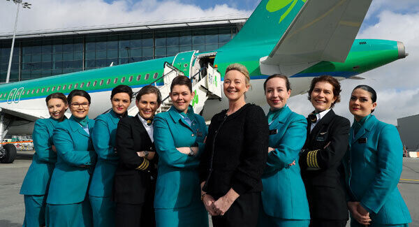 Dublin Airport Duty Manager Sharon Carlyle leads the Flight Crew, Cabin Crew and Guest Service Agents ahead of Aer Lingus flight EI162 which departed for London Heathrow from Dublin at midday today. Pic: MaxwellPhotography.ie