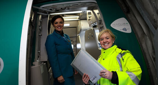 Turnaround Coordinator Eileen Quinn liaises with Cabin Service Manager Fiona Power ahead of Aer Lingus flight EI162. Pic: MaxwellPhotography.ie