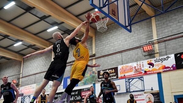 Rami Ghanem, Keanes SuperValu Killorglin, goes for a lay-up, challenged by Paul Dick, Garveys Tralee Warriors, during their National Cup first round clash. Picture: Brendan Moran.