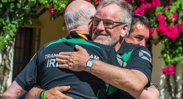 Michael Dwyer hugging John McAleer after the golf singles event at the World Transplant Games in Malaga.