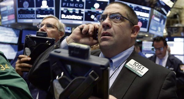 US stocks slip as investors seek safety after weak sales data