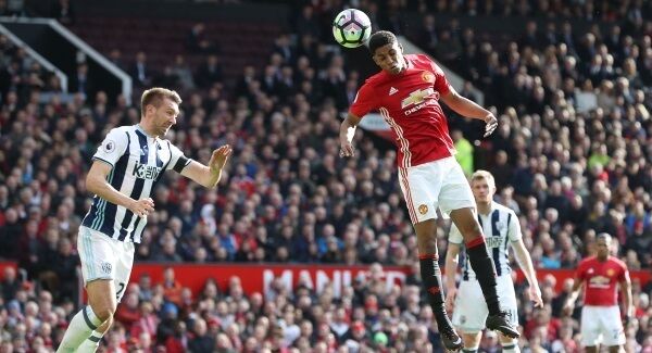 Manchester United's Marcus Rashford (right) in action with West Bromwich Albion's Gareth McAuley during the Premier League match at Old Trafford, Manchester.