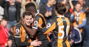 Hull City's Andrew Robertson celebrates scoring his side's first goal of the game with team mates during the Premier League match at KCOM Stadium, Hull.