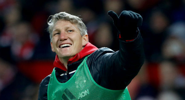 Manchester United's Bastian Schweinsteiger warms-up at Old Trafford. Photo: Martin Rickett/PA
