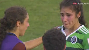 WATCH: Young footballer comforted by twin after they play on opposite sides in World Cup