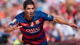 Luis Suarez agrees new Barcelona deal