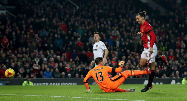 Manchester United's Zlatan Ibrahimovic scores his side's first goal of the game at Old Trafford. Photo: Martin Rickett/PA