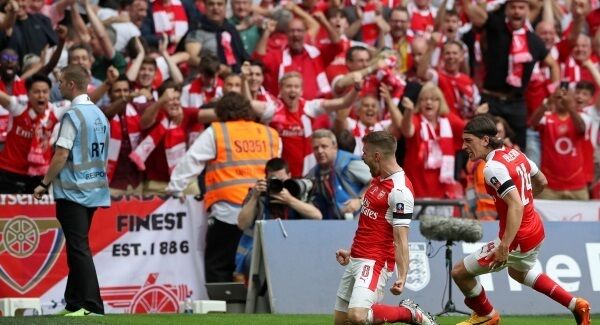 Arsenal's Aaron Ramsey celebrates scoring his side's second goal of the game during the Emirates FA Cup Final Arsenal's Aaron Ramsey celebrates scoring his side's second goal of the game during the Emirates FA Cup Final