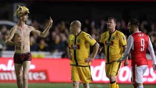 Arsenal streak past spirited Sutton in FA Cup