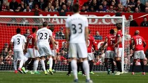 Swansea claim vital point in survival race as they draw at Manchester United
