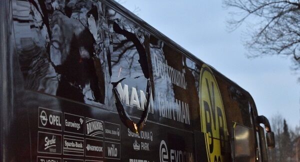 A window of Dortmund's team bus is damaged after the explosion tonight. Pic: AP