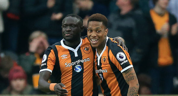 Hull City's Oumar Niasse (left) celebrates scoring his first goal at the KCOM Stadium. Photo: Nigel French/PA