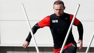 Wayne Rooney back training early as Man United future remains unclear