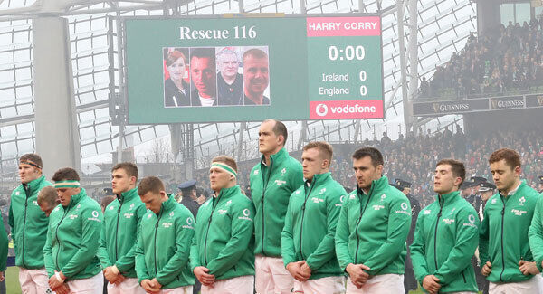 The Ireland team stand for a minute's silence in memory of Captain Dara Fitzpatrick of Rescue Team 116. Pic: INPHO/Billy Stickland