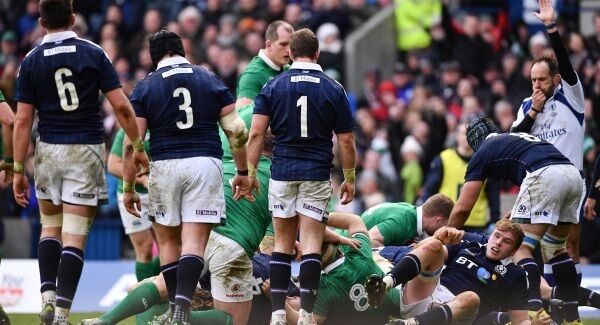 Referee Romain Poite awards a try to Iain Henderson of Ireland after he had dived under Duncan Weir and Ross Ford of Scotland during the RBS Six Nations Rugby Championship match between Scotland and Ireland at BT Murrayfield Stadium in Edinburgh, Scotland. Photo by Ramsey Cardy/Sportsfile