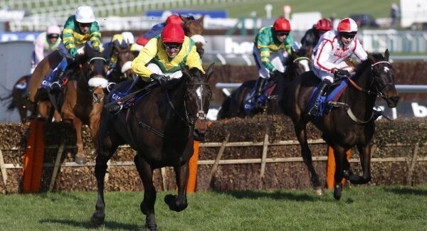 Supasundae ridden by Robbie Power lead the field over the final flight before going on to win The Coral Cup Handicap Hurdle Race at Cheltenham. PRESS ASSOCIATION Photo.