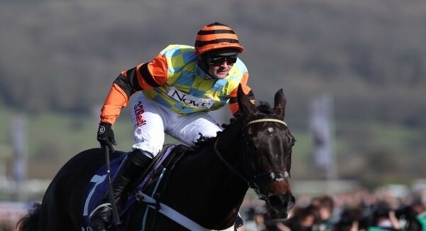 Mite Bite ridden by Nico de Boinville on their way to winning the RSA Novices’ Chase. PRESS ASSOCIATION Photo.