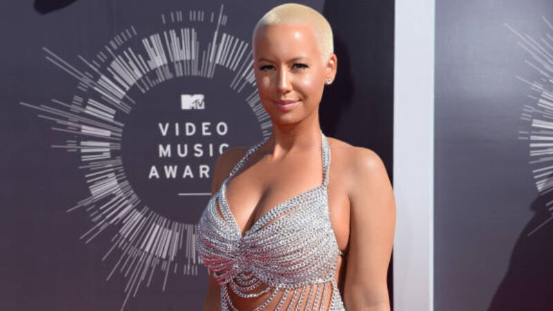Piers Morgan and Amber Rose in Twitter spat after model shares naked image