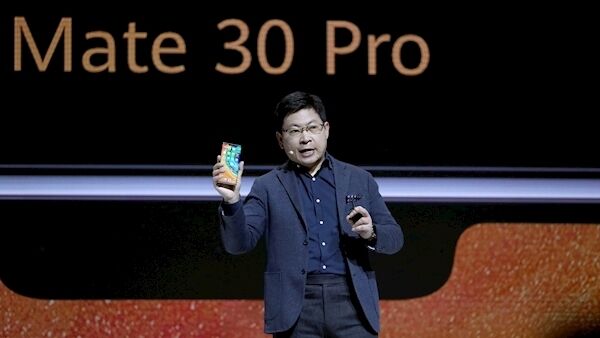Richard Yu, CEO of the Huawei consumer business group, presents the new 'Mate 30 Pro' smartphone during an event in Munich, Germany, Thursday, Sept. 19, 2019. (AP Photo/Matthias Schrader).