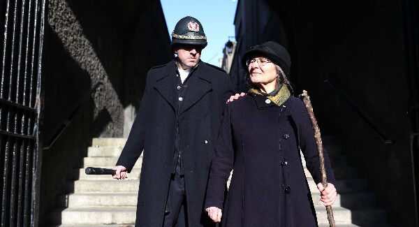 To mark the centenary of women getting the vote in Ireland, Micheline Sheehy the granddaughter of suffragette Hanna Sheehy Skeffington re-enacts her grandmother smashing the windows of Dublin Castle to highlight women's disenfranchisement. Pic: Niall Carson/PA Wire