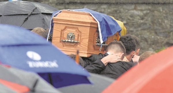 GAA player who died in US laid to rest beside his father