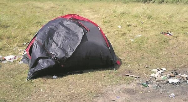 Tents abandoned in the dunes area of Ardnahinch Beach in East Cork.