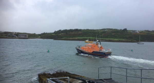 volunteer lifeboat crew rescue injured female off west