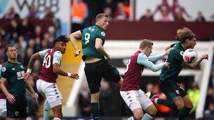 Wood earns late point as Burnley twice battle back to draw at Aston Villa