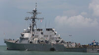 Latest: Bodies found on flooded US warship after collision