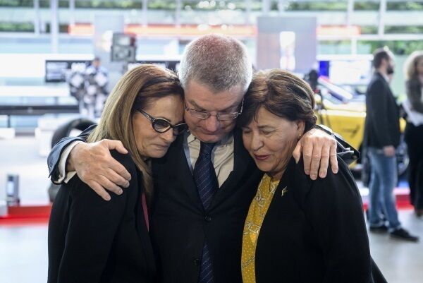 President of the International Olympic Committee Thomas Bach comforts Ilana Romano, widow of Israeli weightlifter Josef Romano, left, and Anke Spitzer, widow of Israeli fencing coach Andre Spitzer, right. President of the International Olympic Committee Thomas Bach comforts Ilana Romano, widow of Israeli weightlifter Josef Romano, left, and Anke Spitzer, widow of Israeli fencing coach Andre Spitzer, right.