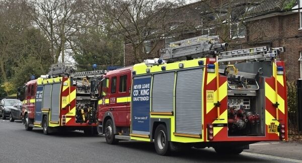 London Fire Brigade handout photo of firefighters damping down after they tackled a blaze at the Adventure cafe and shop near the Meerkat enclosure in London Zoo.