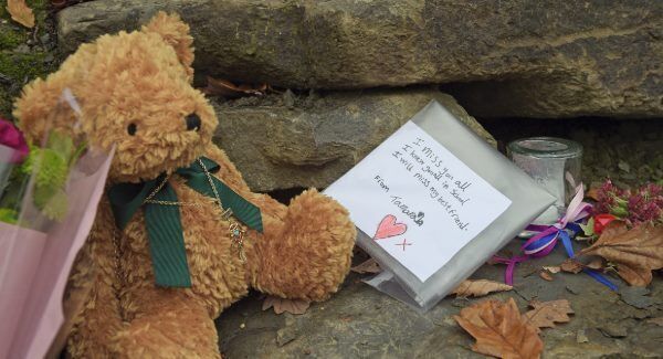 Flowers left close to the scene in. Photo: Ben Birchall/PA Wire