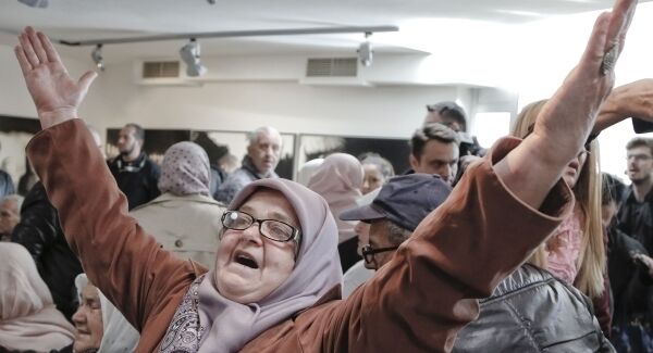 Ediba Salihovic raises her hands as she reacts along with other Bosnian women upon hearing the sentence at the end of former Bosnian Serb military chief Gen. Ratko Mladic's trial. Pic: AP Photo/Amel Emric Ediba Salihovic raises her hands as she reacts along with other Bosnian women upon hearing the sentence at the end of former Bosnian Serb military chief Gen. Ratko Mladic's trial. Pic: AP Photo/Amel Emric
