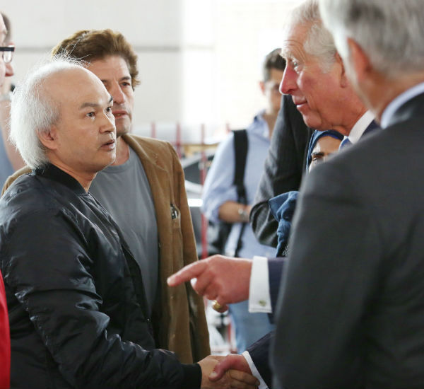 Prince Charles meeting local residents, including Anh Nhu Nguyen (left, dark shirt, shaking hands), during a visit to the Westway Sports Centre in the aftermath of the Grenfell Tower disaster in west London. Photo: Philip Toscano/PA Prince Charles meeting local residents, including Anh Nhu Nguyen (left, dark shirt, shaking hands), during a visit to the Westway Sports Centre in the aftermath of the Grenfell Tower disaster in west London. Photo: Philip Toscano/PA