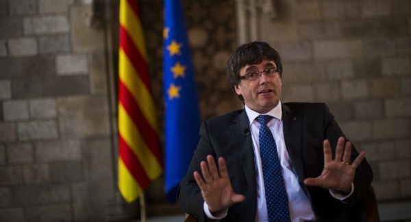 Spanish judge mulls arrest warrant for ex-Catalan leader Carles Puigdemont