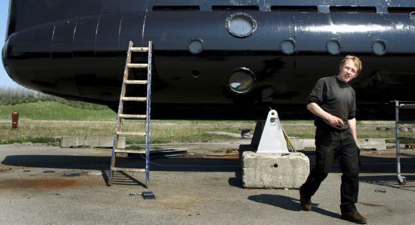 A submarine and its owner Peter Madsen. Photo: Niels Hougaard /Ritzau via AP, File