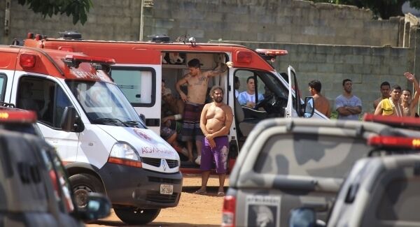 Injured prisoners receive medical care in an ambulance after a rebellion at the Colonia Agroindustrial prison in the Aparecida de Goiania Complex in the state of Goias, Brazil.