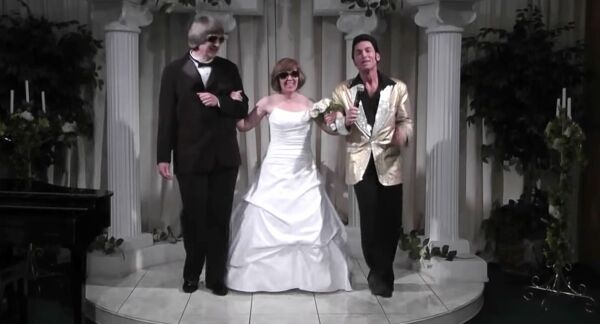 Image made from a video provided by A Elvis Chapel of David Allen Turpin, left, and his wife, Louise Anna Turpin, center, celebrating a renewal of their wedding vows with Elvis impersonator Kent Ripley in Las Vegas
