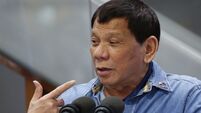 Philippine president offers bounty to government forces for the killing of communist rebels to cut war costs
