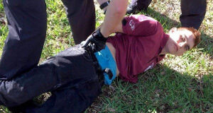 Nikolas Cruz detained after school shooting attack.