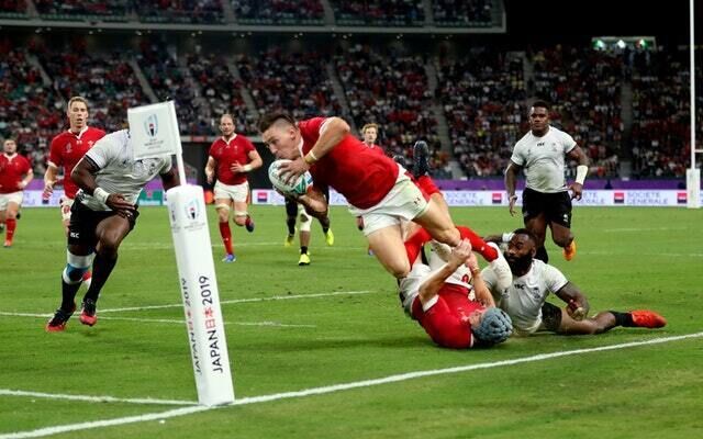 Wales’s Josh Adams scores his side’s third try against Fiji (David Davies/PA) Wales’s Josh Adams scores his side’s third try against Fiji (David Davies/PA)