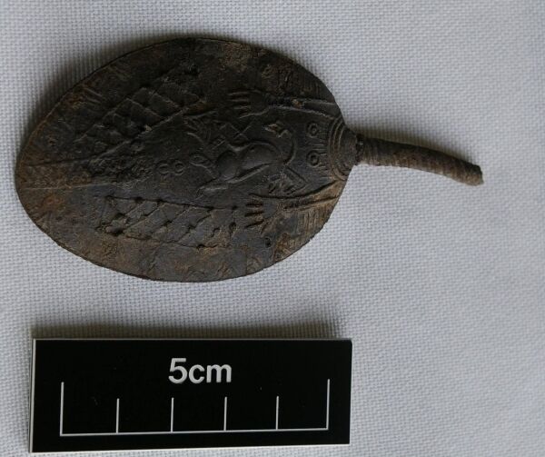 A 13th-century pewter spoon decorated with the symbolic image of a dog. Picture: Maurice F Hurley