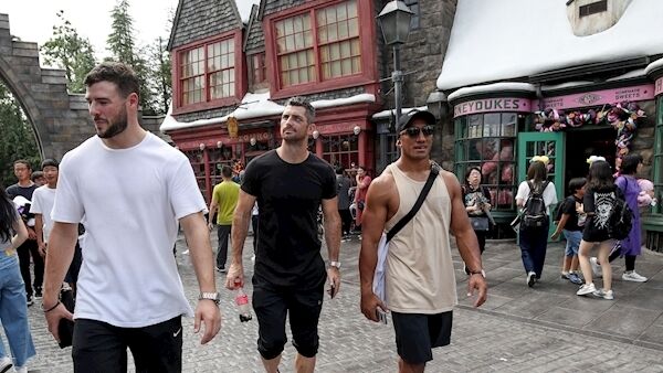 Robbie Henshaw, Rob Kearney and Bundee Aki take a walk through the Harry Potter village of Hogsmeade at Universal Studios Japan ©INPHO/Dan Sheridan