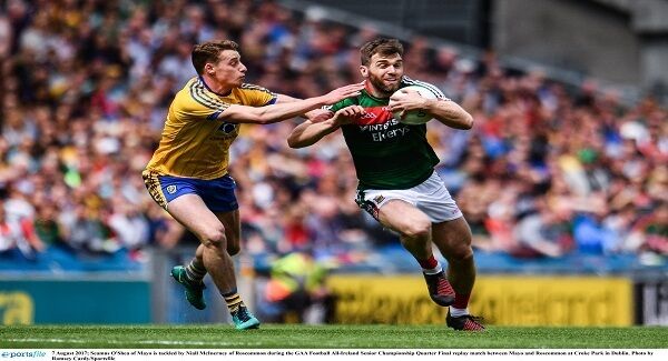 Seamus O&rsquo;Shea of Mayo is tackled by Niall McInerney of Roscommon during the GAA Football All-Ireland Senior Championship Quarter Final replay match between Mayo and Roscommon at Croke Park in Dublin. Photo by Ramsey Cardy/Sportsfile