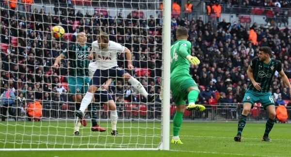 Tottenham Hotspur&rsquo;s Harry Kane (second left) scores his side&rsquo;s first goal, creating history. Picture: Steven Paston/PA Wire.
